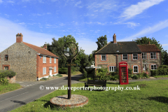 Summertime, village green sign, Great Snoring