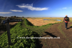 Walker on the North Norfolk Coastal Path, Thornham