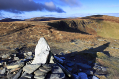 The summit cairn of Bannerdale Crags fell