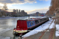 Frozen river Nene and narrowboat, Peterborough City