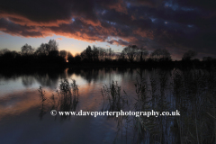 Autumn sunset over a Fenland waterway near Ely