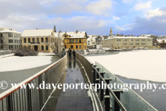 The frozen Tjornin lake, Reykjavik City Hall