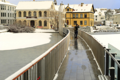 The frozen Tjornin lake, Reykjavik City Hall