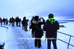 Tourists walking at Pingvellir National Park