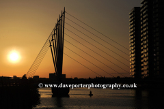 Sunset over the Media City Footbridge, Salford Quays, Manchester, Lancashire, England, UK