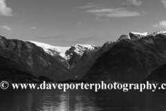 Reflections of the mountains in Hardangerfjord