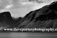 Reflections of mountains in Sognefjorden Fjord