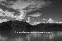 Reflections of mountains in Hardangerfjord Fjord