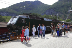 Passengers at the railway station, town of Flam