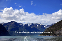 Reflections of mountains in Aurlandsfjorden Fjord