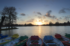 Sunset, rowing boats on the Mere at Thorpeness