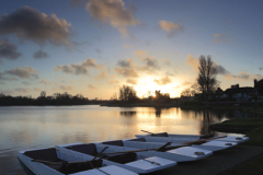 Sunset, rowing boats on the Mere at Thorpeness