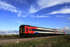 East Midlands train 158 785 passing Whittlesey town, Fenland, Cambridgeshire, England