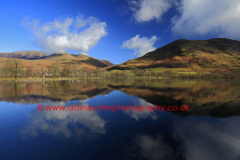 Autumn. Whiteless Pike, reflected in Buttermere