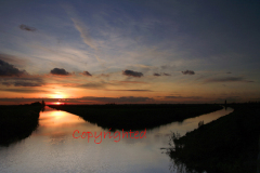 Sunset over a Fenland drain waterway near March